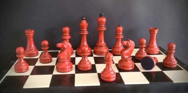 Red Pieces from Soviet Grandmaster Chess Set on Board